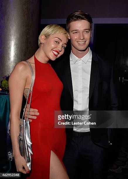 Recording artist Miley Cyrus and Patrick Schwarzenegger attend the Pre-GRAMMY Gala and Salute to Industry Icons honoring Martin Bandier at The...