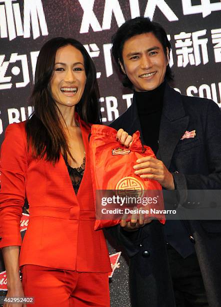 Actress Maggie Q and actor Chen Kun attend Maggie Q Toasts The Chinese New Year at Times Square on February 7, 2015 in New York City.