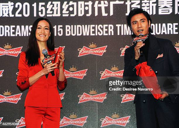 Actress Maggie Q and actor Chen Kun attend Maggie Q Toasts The Chinese New Year at Times Square on February 7, 2015 in New York City.