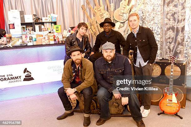 Musicians Tom Higgenson, De'Mar Hamilton, Dave Tirio. Tim G. Lopez and Mike Retondo of Plain White T's attend the GRAMMY gift lounge during The 57th...