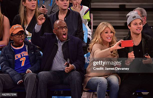 Nicolas Roker, Al Roker, Christie Brinkley and Jack Paris Brinkley Cook attend Golden State Warriors vs New York Knicks game at Madison Square Garden...