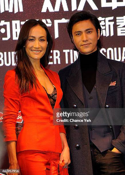 Maggie Q and Chen Kun attend Maggie Q Toasts The Chinese New Year at Times Square on February 7, 2015 in New York City.