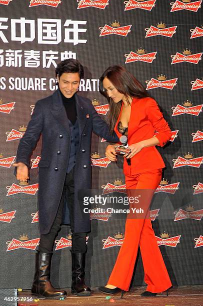 Chen Kun and Maggie Q attend Maggie Q Toasts The Chinese New Year at Times Square on February 7, 2015 in New York City.