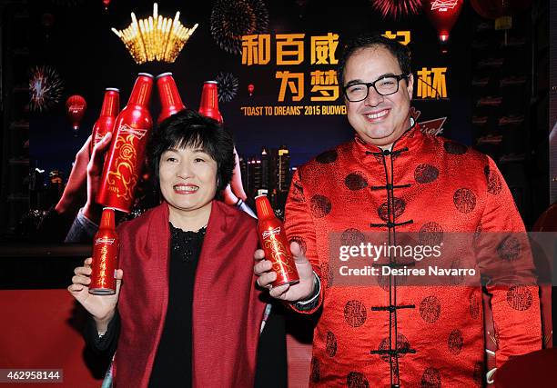 Ambassador Zhang Qiyue, Chinese Consul General in New York and Global Chief Marketing Officer at Anheuser-Busch Miguel Patricio attend Maggie Q...