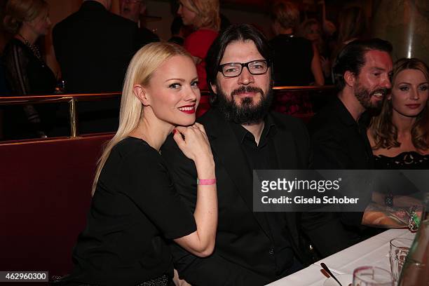 Franziska Knuppe and husband Christian Moestl attend the Bild 'Place to B' Party at Borchardt Restaurant on February 7, 2015 in Berlin, Germany.