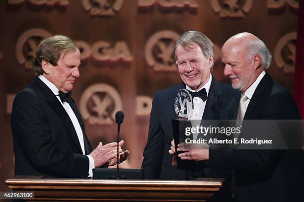 Director James Burrows accepts the Lifetime Achievement in Television Direction Award from producers Glen Charles and Les Charles onstage at the 67th...