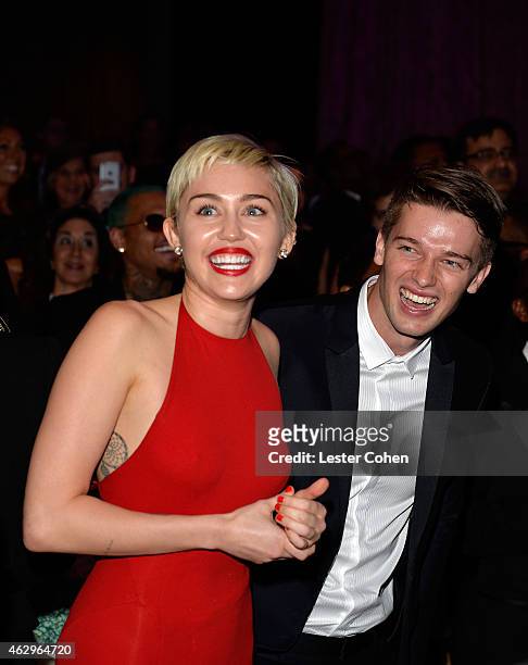 Singer Miley Cyrus and Patrick Schwarzenegger attend the Pre-GRAMMY Gala and Salute to Industry Icons honoring Martin Bandier at The Beverly Hilton...