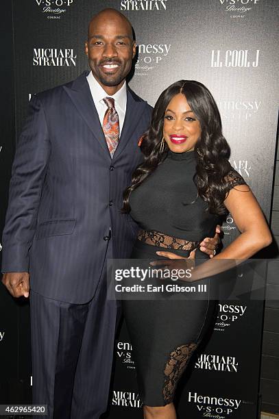 Jay Tucker and wife Niecy Nash attend the Hennesst Toasts Achievements In Music on February 7, 2015 in Los Angeles, California.