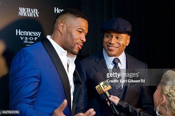 Host Michael Strahan and LL Cool J are being intervied at the Hennessy Toasts Achievements on February 7, 2015 in Los Angeles, California.