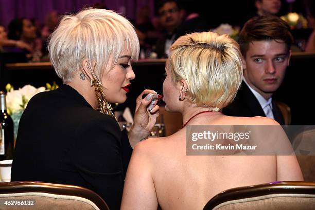 Rita Ora and Miley Cyrus attend the Pre-GRAMMY Gala And Salute To Industry Icons Honoring Martin Bandier at The Beverly Hilton on February 7, 2015 in...