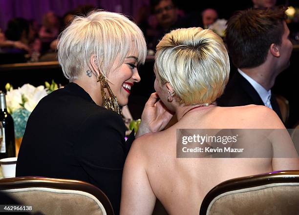 Rita Ora and Miley Cyrus attend the Pre-GRAMMY Gala And Salute To Industry Icons Honoring Martin Bandier at The Beverly Hilton on February 7, 2015 in...