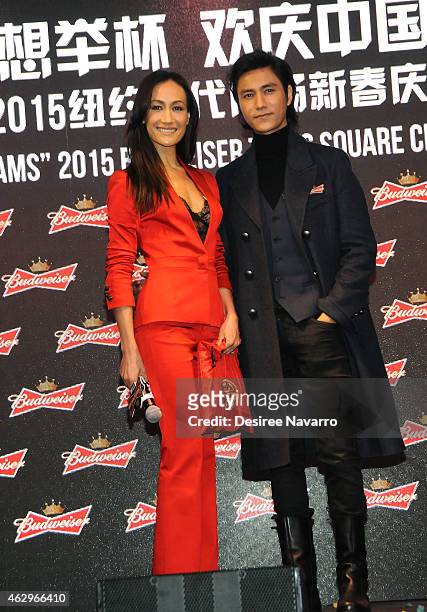 Actress Maggie Q and actor Chen Kun attend Maggie Q Toasts The Chinese New Year at Times Square on February 7, 2015 in New York City.