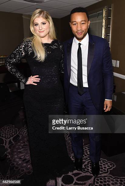 Singers Meghan Trainor and John Legend attend the Pre-GRAMMY Gala and Salute To Industry Icons honoring Martin Bandier at The Beverly Hilton Hotel on...