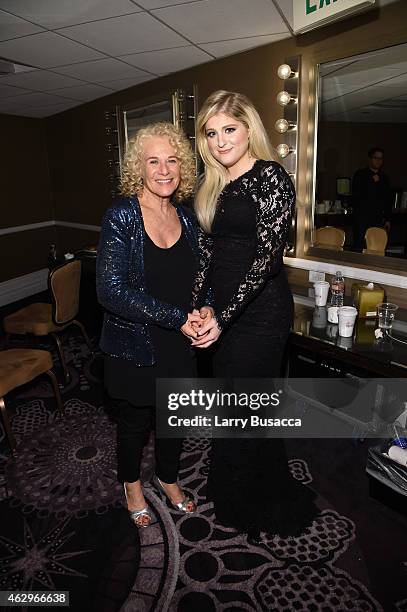 Singers Carole King and Meghan Trainor attend the Pre-GRAMMY Gala and Salute To Industry Icons honoring Martin Bandier at The Beverly Hilton Hotel on...