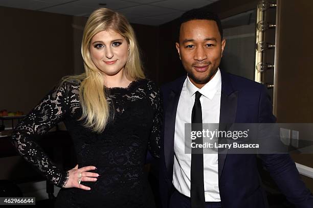 Singers Meghan Trainor and John Legend attend the Pre-GRAMMY Gala and Salute To Industry Icons honoring Martin Bandier at The Beverly Hilton Hotel on...