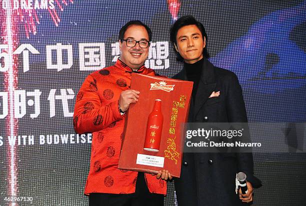 Global Chief Marketing Officer at Anheuser-Busch Miguel Patricio and actor Chen Kun attend Maggie Q Toasts The Chinese New Year at Times Square on...