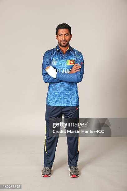 Dhammika Prasad poses during the Sri Lanka 2015 ICC Cricket World Cup Headshots Session at the Rydges Latimer on February 8, 2015 in Christchurch,...