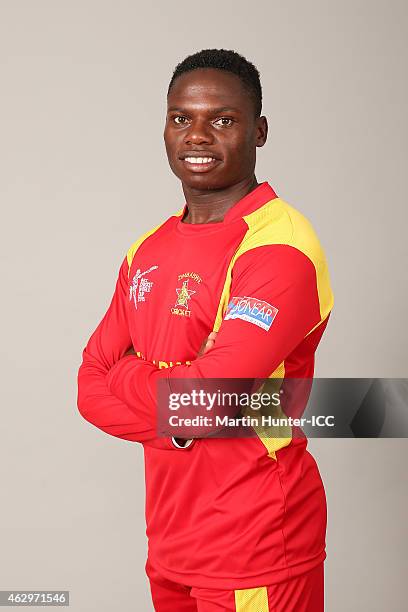 Tawanda Mupariwa poses during the Zimbabwe 2015 ICC Cricket World Cup Headshots Session at the Rydges Latimer on February 8, 2015 in Christchurch,...