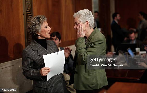 Environmental Protection Agency Administrator Gina McCarthy confers with Senate Environment Committee Chairman Sen. Barbara Boxer before the start of...