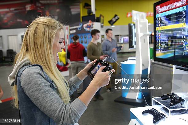 Olivia Holt attends the Dylan Riley Snyder Races Into His 18th Year With Nintendo at K1 Speed on February 7, 2015 in Gardena, California.