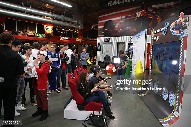 Guests playing MarioKart at the Dylan Riley Snyder Races Into His 18th Year With Nintendo at K1 Speed on February 7, 2015 in Gardena, California.