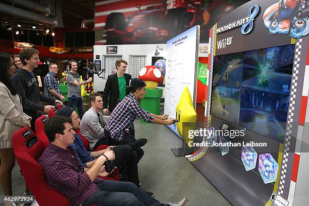 Guests playing MarioKart at the Dylan Riley Snyder Races Into His 18th Year With Nintendo at K1 Speed on February 7, 2015 in Gardena, California.