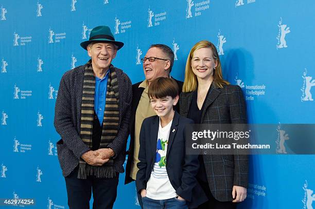 Sir Ian McKellen, director Bill Condon, Laura Linney and Milo Parker attend the 'Mr. Holmes' photocall during the 65th Berlinale International Film...