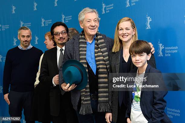 Iain Canning, guest, director Bill Condon, Hiroyuki Sanada, Sir Ian McKellen, Laura Linney and Milo Parker attend the 'Mr. Holmes' photocall during...