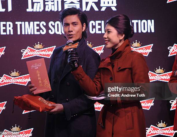 Actor Chen Kun speaks on stage during Maggie Q toasts the Chinese New Year at Times Square on February 7, 2015 in New York City.