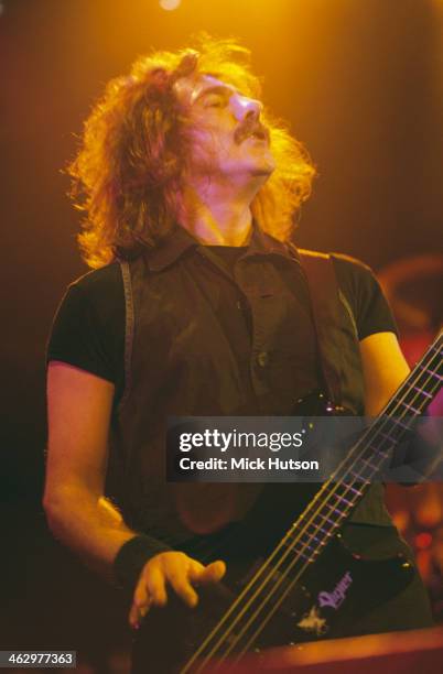 Bassist Geezer Butler performing with British heavy metal group Black Sabbath at the Hammersmith Apollo, London, 13th April, 1994.