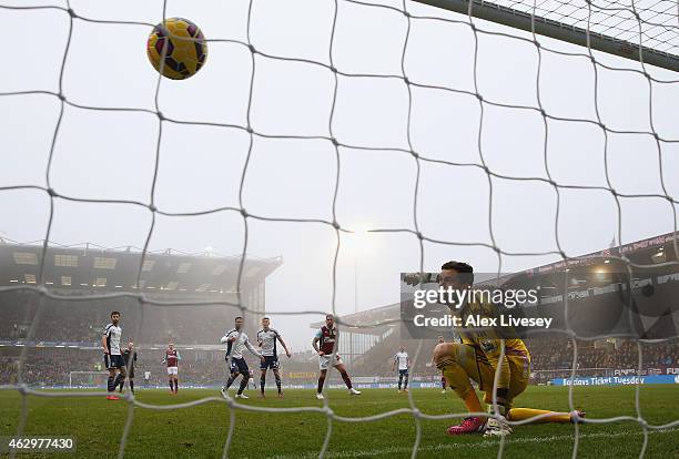 Danny Ings of Burnley scores their second goal past Ben Foster of West Brom during the Barclays Premier League match between Burnley and West...