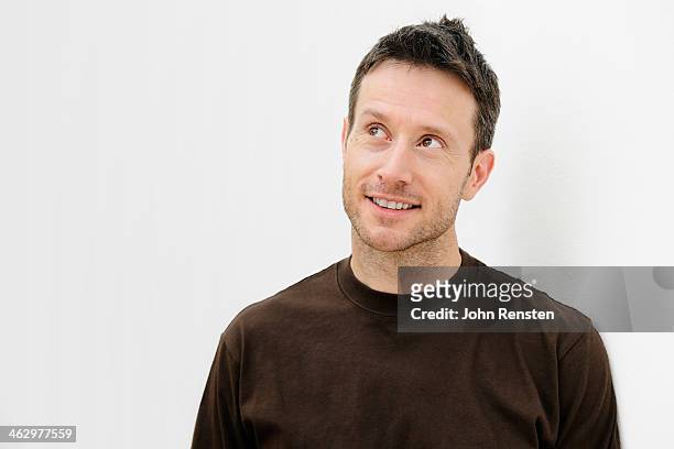 studio portraits of happy, optimistic people - man thinking stock pictures, royalty-free photos & images