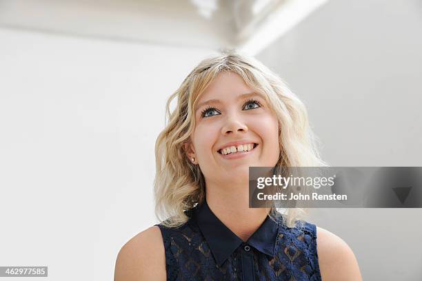 studio portraits of happy, optimistic people - vrouw spleetje tanden stockfoto's en -beelden