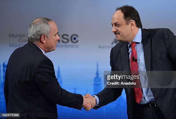 Israeli Inteligence, International Relations and Strategic Minister Yuval Steinitz shakes hand with Qatar's Minister of Foreign Affairs Khalid...