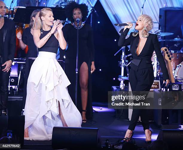 Iggy Azalea and Rita Ora perform onstage during The Grammy Awards Pre-Grammy Gala held at The Beverly Hilton Hotel on February 7, 2015 in Beverly...