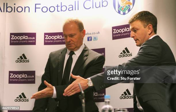 New West Bromwich Albion manager Pepe Mel is shown to his seat at the table by Richard Garlick, sporting and technical director, before facing the...