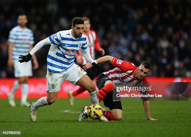 Adel Taarabt of QPR gets away from Morgan Schneiderlin of Southampton during the Barclays Premier League match between Queens Park Rangers and...