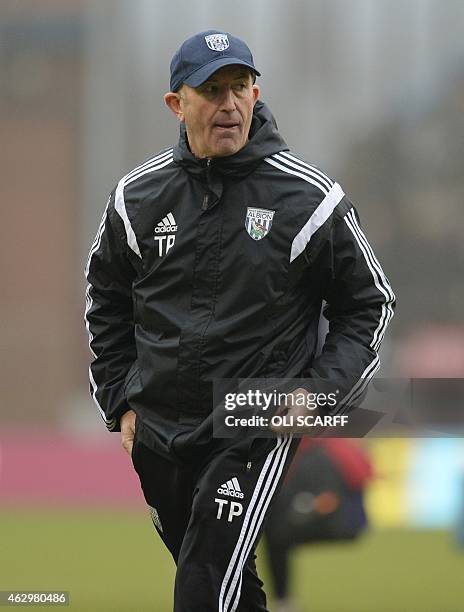 West Bromwich Albion's Welsh Head Coach Tony Pulis leaves the pitch at the final whistle in the English Premier League football match between Burnley...