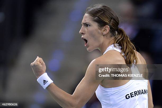 Germany's Andrea Petkovic reacts during her match against Australia's Jarmila Gajdosova in the FedCup World Group quarterfinal between Germany and...