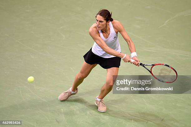 Andrea Petkovic of Germany plays a backhand in her single match against Jarmila Gajdosova of Australia during the Fed Cup 2015 World Group First...
