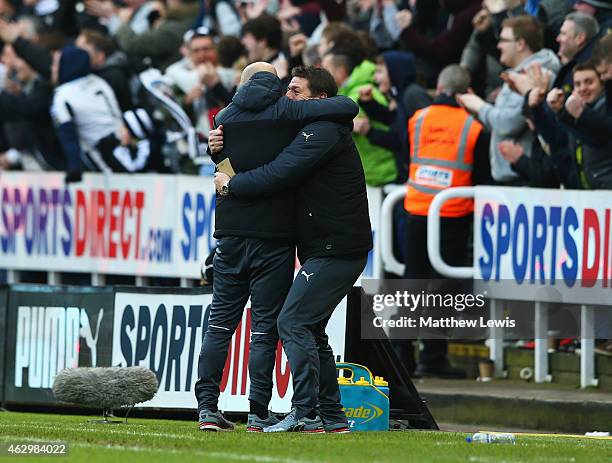 John Carver interim manager of Newcastle United and coach Steve Stone celebrate as Jack Colback of Newcastle United scores their first goal during...