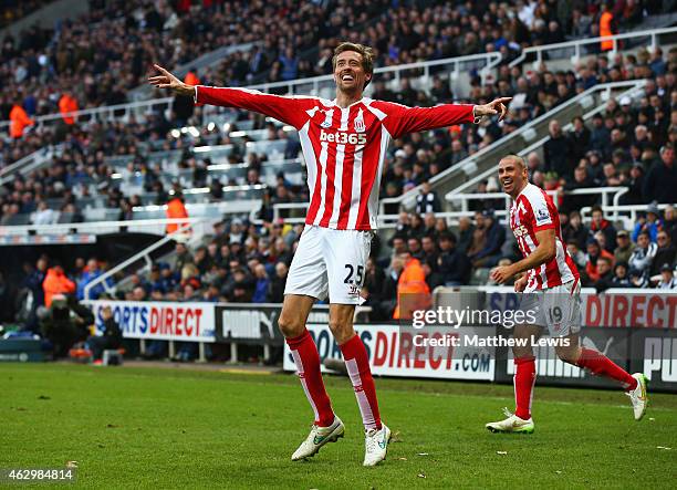 Peter Crouch of Stoke City celebrates with Jonathan Walters as he scores their first and equalising goal during the Barclays Premier League match...