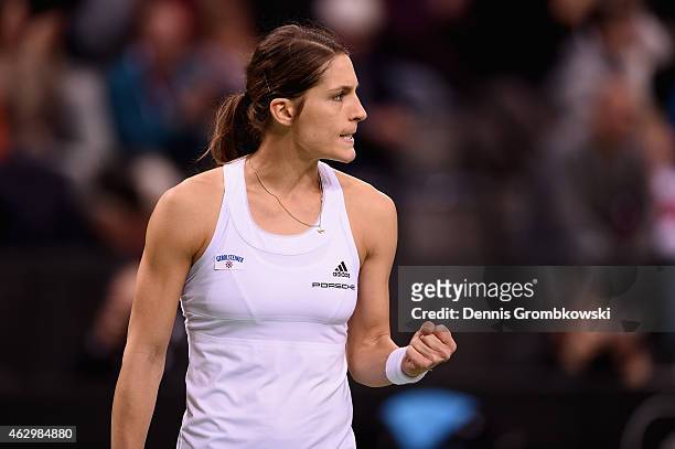 Andrea Petkovic of Germany celebrates a point during her single match against Jarmila Gajdosova of Australia during the Fed Cup 2015 World Group...