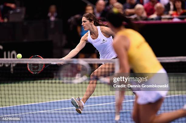 Andrea Petkovic of Germany plays a forehand in her single match against Jarmila Gajdosova of Australia during the Fed Cup 2015 World Group First...