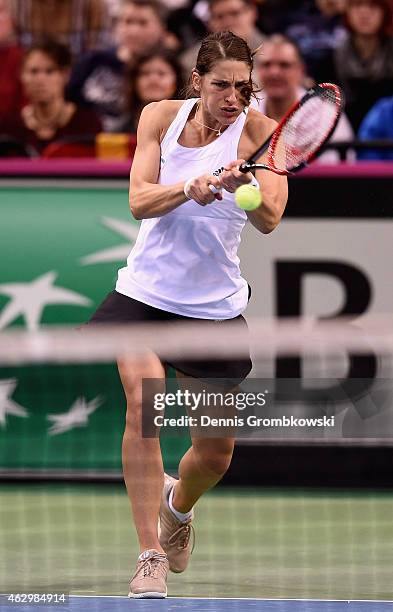 Andrea Petkovic of Germany plays a backhand in her single match against Jarmila Gajdosova of Australia during the Fed Cup 2015 World Group First...