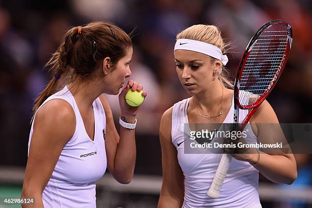 Julia Goerges and Sabine Lisicki of Germany exchange words during the Fed Cup 2015 World Group First Round tennis between Germany and Australia at...