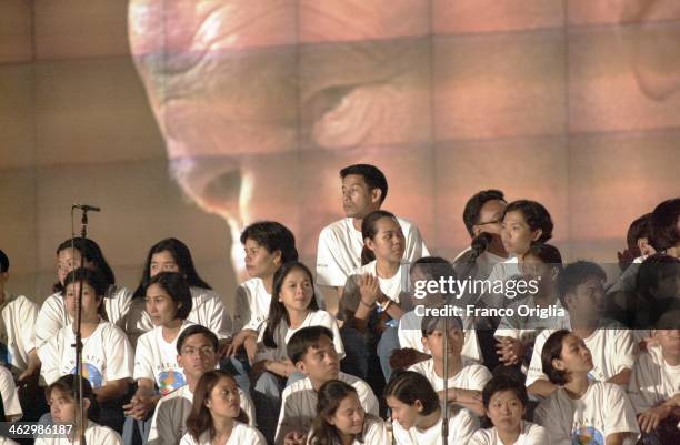 Young people attend a mass at the Tor Vergata University campus held by Pope John Paul II to celebrate the end of the 15th World Youth Days on August...