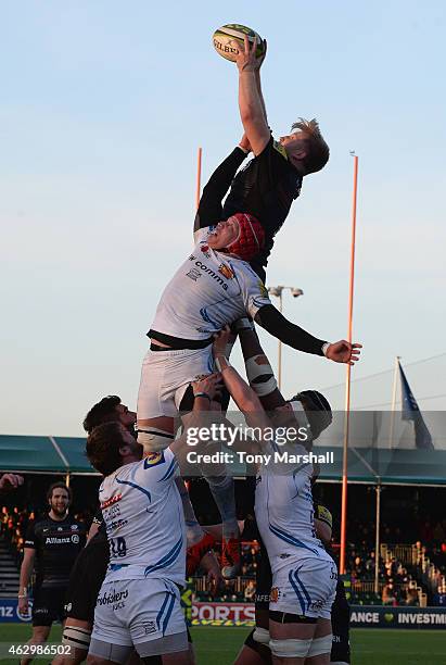 Jackson Wray of Saracens outjumps Tom Johnson of Exeter Chiefs to win the ball in the lineout during the LV= Cup match between Saracens and Exeter...