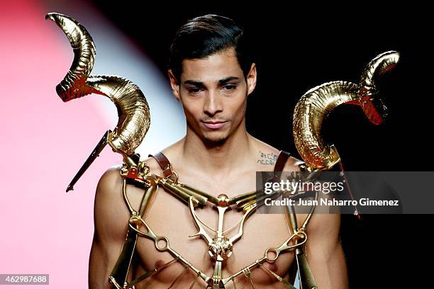 Model walks the runway at the Francis Montesinos show during Madrid Fashion Week Fall/Winter 2015/16 at Ifema on February 8, 2015 in Madrid, Spain.