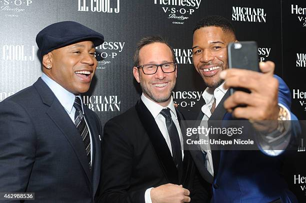 Cool J, Richard Weitz and Michael Strahan take a selfie at the Hennessy Toasts Achievements In Music on February 7, 2015 in Los Angeles, California.